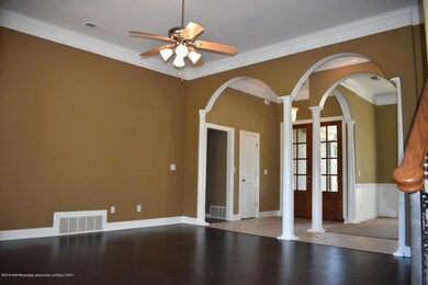 living room with columns