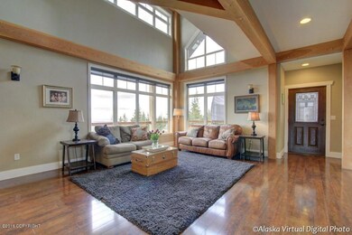 Living Area With Two-Story Ceiling
