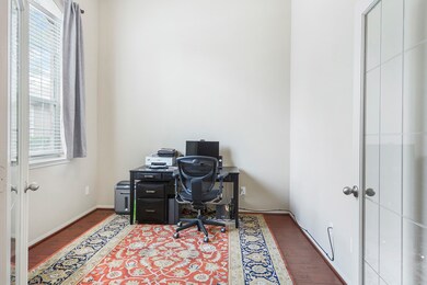 Formal study has wood floors and nice french doors.