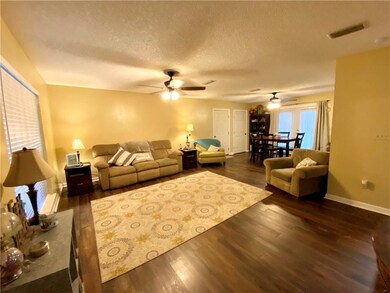 Open Floor plan features Great Room with laminate