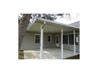 Covered patio area located off the living room, co