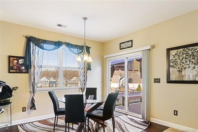 Bright and inviting dining area with tons of natur