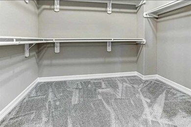Master closet, lots of shelving