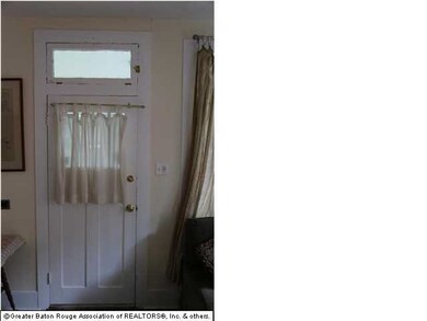 Inside shot of front door. Note transom!