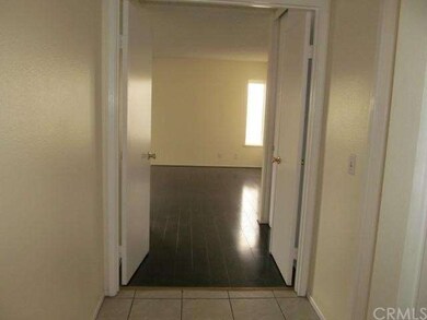 Double door entry to master bedroom showing lamina