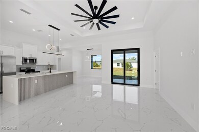 1261 NE 40th St, Cape Coral, FL 33909 - photo 4