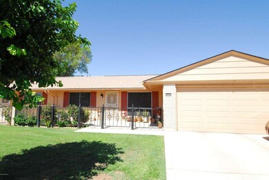 10527 W TROPICANA CIR.