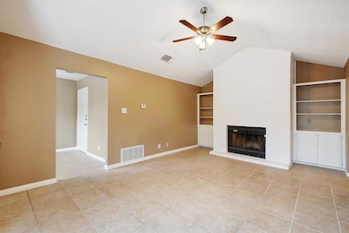 Unfurnished living room with light tile patterned