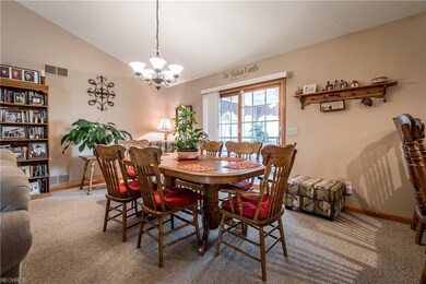 Dining room with patio door to the sunroom
