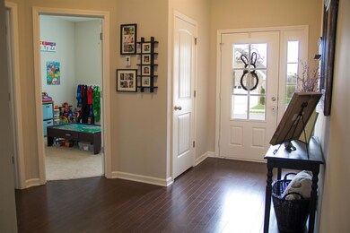 Spacious entry foyer with coat closet