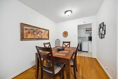 Additional view of the dining room with hardwood f