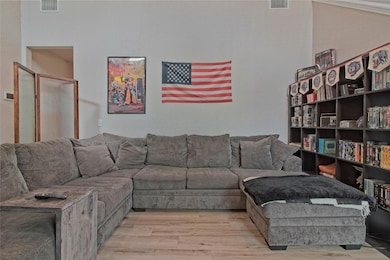 Living area featuring wood finished floors