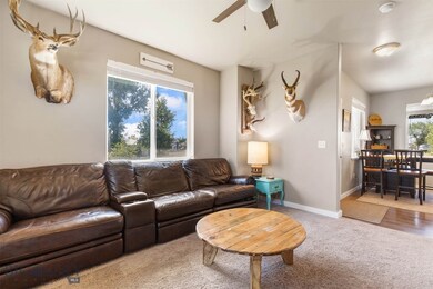 Spacious living room with high ceilings and plenty