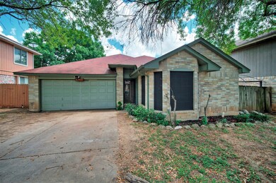 View of front of home featuring concrete driveway