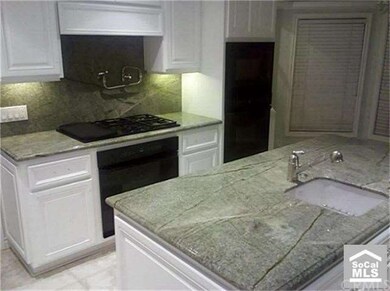 Kitchen (Dacor 5 burner cooktop & range & pot-fill