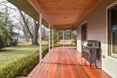 COVERED WRAP AROUND FRONT PORCH