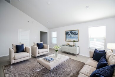 The open floor plan seamlessly connects the living