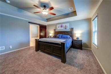 Master Bedroom with vaulted ceiling and custom mad