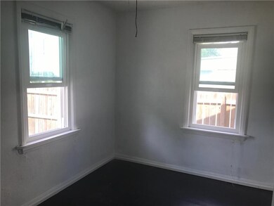Bedroom with wood floors