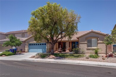 View of front of home featuring stucco siding, dri