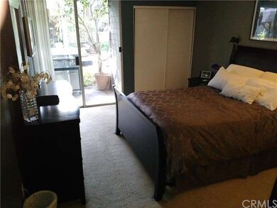 Master bedroom with patio exit.