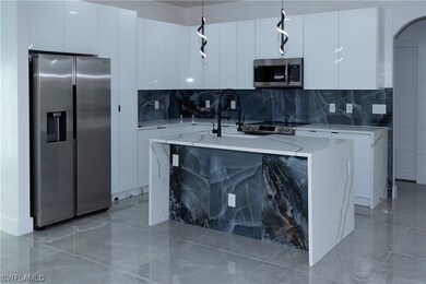 1409 Santa Barbara Blvd N, Cape Coral, FL 33993 - photo 5