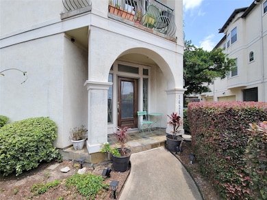 This photo shows a welcoming entrance to a townhou