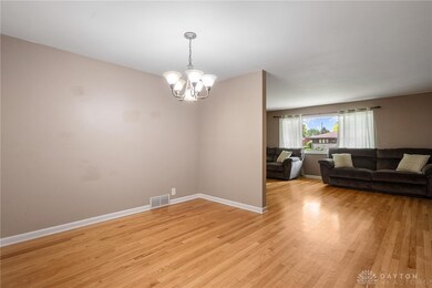 Dining Room with Hardwood Flooring