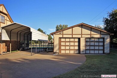 Detached double car garage makes a great work shop