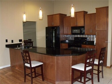 Updated kitchen, granite, tin backsplash.