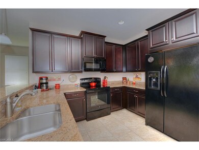 Upgraded Granite kitchen with espresso cabinets an