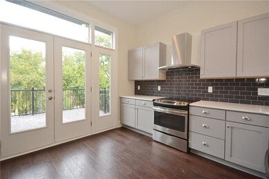 Kitchen picture may be for a different unit, but s
