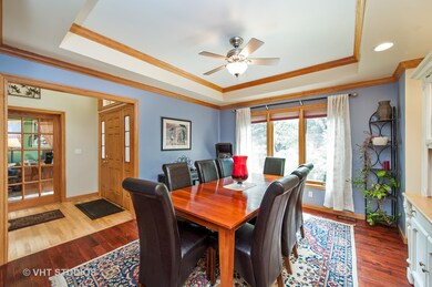 Dining room has beautifully accented Acacia hardwo