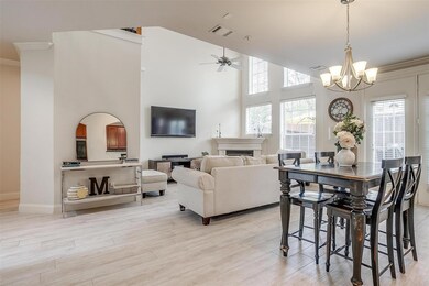 Bright and airy living room with soaring ceilings,