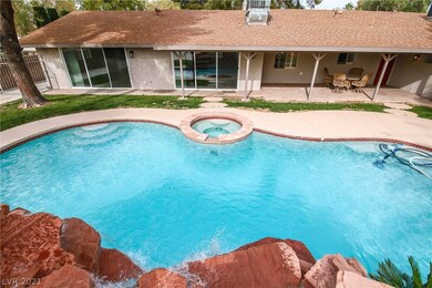 Pool/spa combo with waterfall