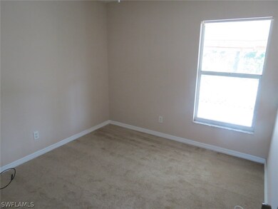909 Medford Ave S, Lehigh Acres, FL 33974 - photo 7