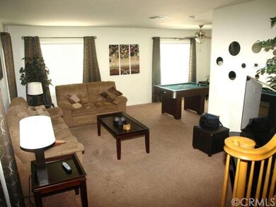 Formal living room and adjoining dining room (curr