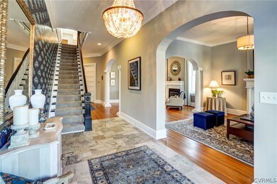 View from foyer into front parlor - original arched doorway