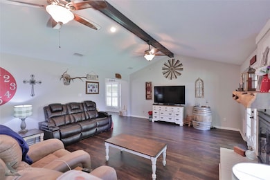 Living room featuring dark wood-type flooring, cei