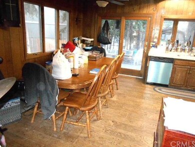 Eating area has lots of windows.