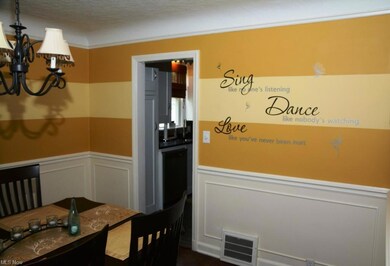 FORMAL DINING ROOM WITH HARDWOOD FLOORS