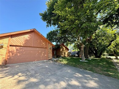 View of front of property with a front yard