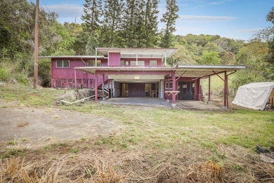 1.87 acres, 3 bd/1.5 ba home.