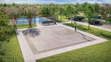 View of basketball court featuring community bask