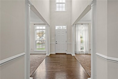 Guests are greeted by a beautifully open two-story