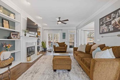 Inviting and beautifully styled living room featur