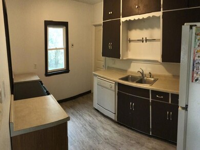 Laminate floor throughout the dining and living ro