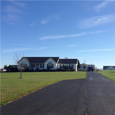 One acre well kept lot and cottage home.  Great price for the features.