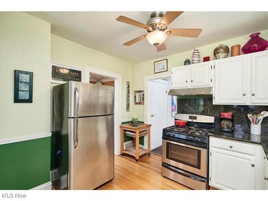 updated kitchen with granite countertops, stainless steel appliances