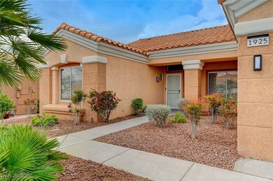 Doorway to property with stucco siding